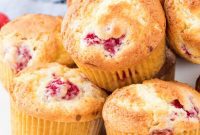 Fluffy Raspberry Muffins Bursting with Juicy Berries