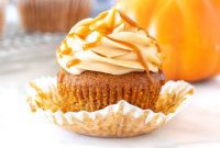 Rich Pumpkin Spice Cupcakes with Caramel Cream Cheese Swirl
