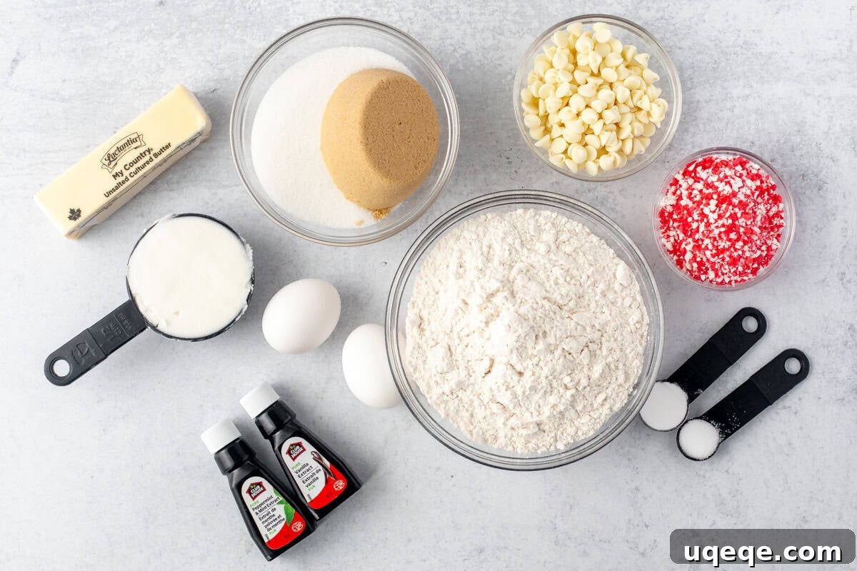 Peppermint Swirl White Chocolate Delights 3 Ingredients for making white chocolate candy cane cookies laid out on a kitchen surface
