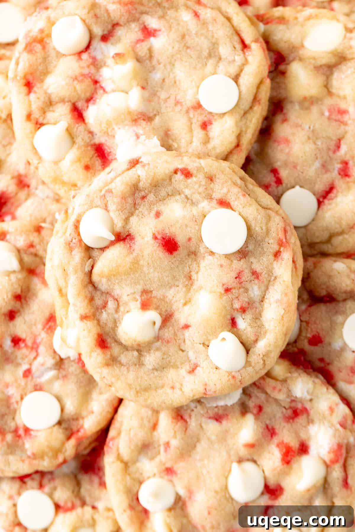 Peppermint Swirl White Chocolate Delights 4 Close-up of cookie dough mixed with white chocolate chips and crushed candy canes