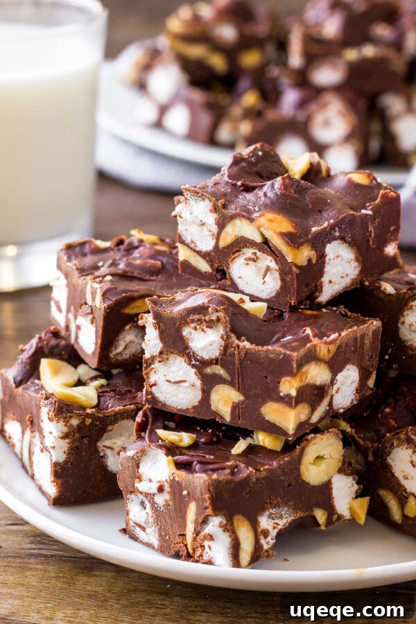 Ultimate Rocky Road Fudge 2 Easy Rocky Road Fudge - extra creamy chocolate with marshmallows and crunchy peanuts.