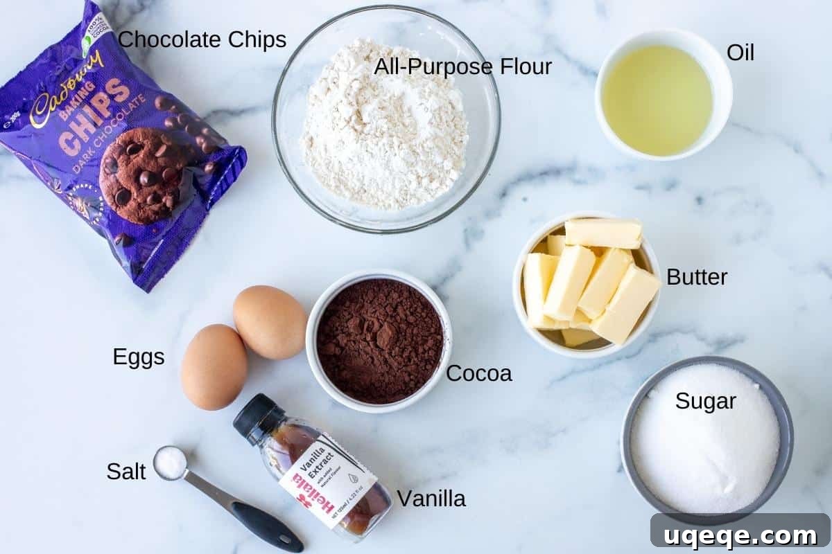 Perfectly Chewy Fudgy Homemade Brownies with Rich Cocoa 3 Ingredients for homemade brownies laid out on a table