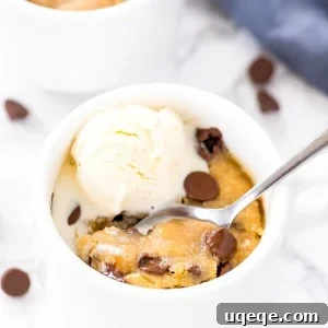 Chocolate chip cookie in a mug - a soft, chewy, deep dish cookie that's made in the microwave
