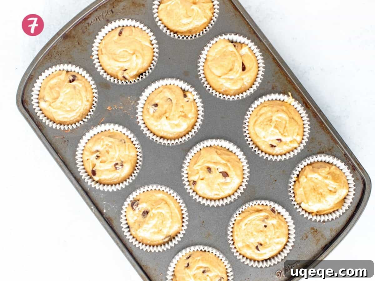 Irresistible Peanut Butter Muffins 6 Muffin tin of unbaked peanut butter muffins, ready for the oven