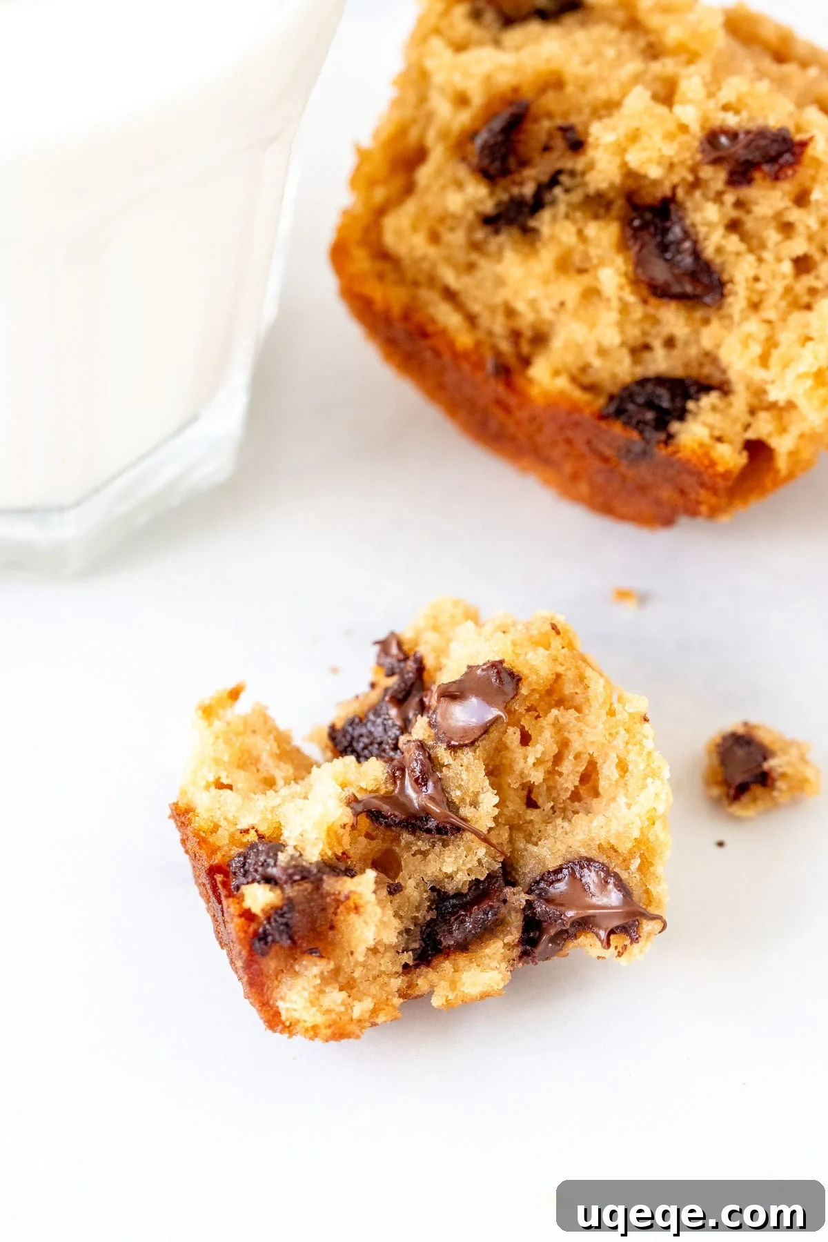 Irresistible Peanut Butter Muffins 7 Piece of warm peanut butter chocolate chip muffin with glass of milk, inviting and delicious