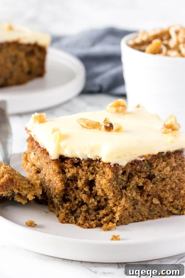 Summer Zucchini Spice Cake 2 This moist, tender zucchini cake is filled with spices and topped with cream cheese frosting.
