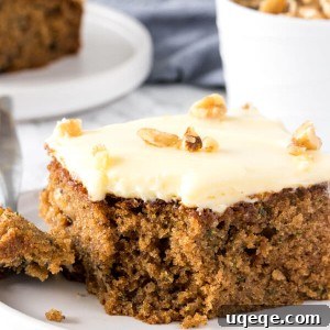 Summer Zucchini Spice Cake 5 This moist, tender zucchini cake is filled with spices and topped with cream cheese frosting.