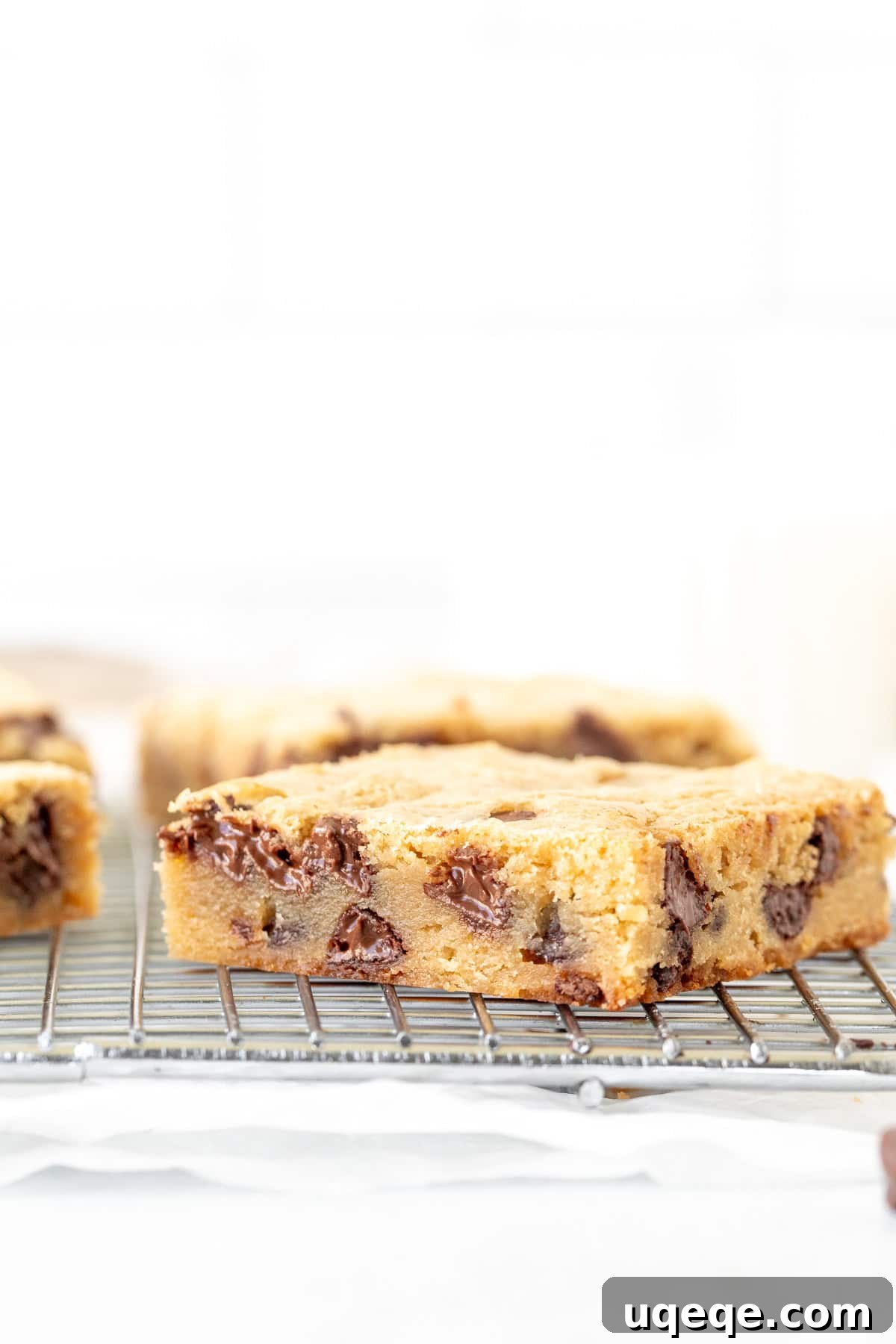 Blondie Bliss 3 Delicious chocolate chip blondie cooling on a wire rack