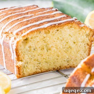 Glazed lemon zucchini bread is moist and tender with a delicious lemon flavor, ready to be served and enjoyed by everyone.
