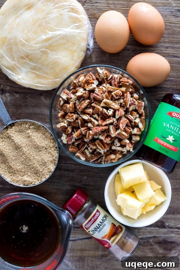 A visual display of all the key ingredients needed to bake a classic pecan pie, neatly arranged and ready for preparation.