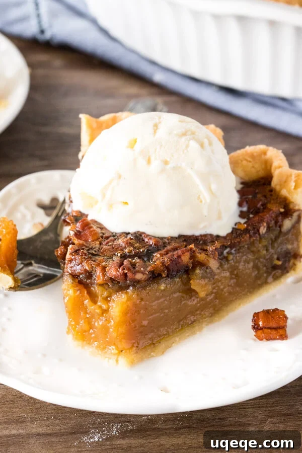 A delectable slice of pecan pie, adorned with a scoop of melting vanilla ice cream, showing a bite taken out to reveal its rich, chewy texture and the perfect set of the filling.