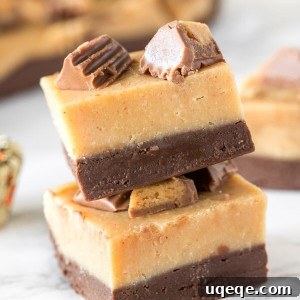 Chocolate Peanut Butter Buckeye Fudge 5 Two pieces of layered chocolate peanut butter fudge stacked on top of each other