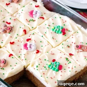 A 9x13 inch pan of gingerbread cookie bars cut into squares.