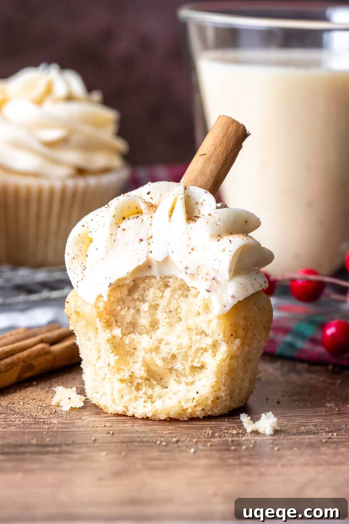 Festive Eggnog Cupcakes 5 Eggnog cupcake with a bite taken out