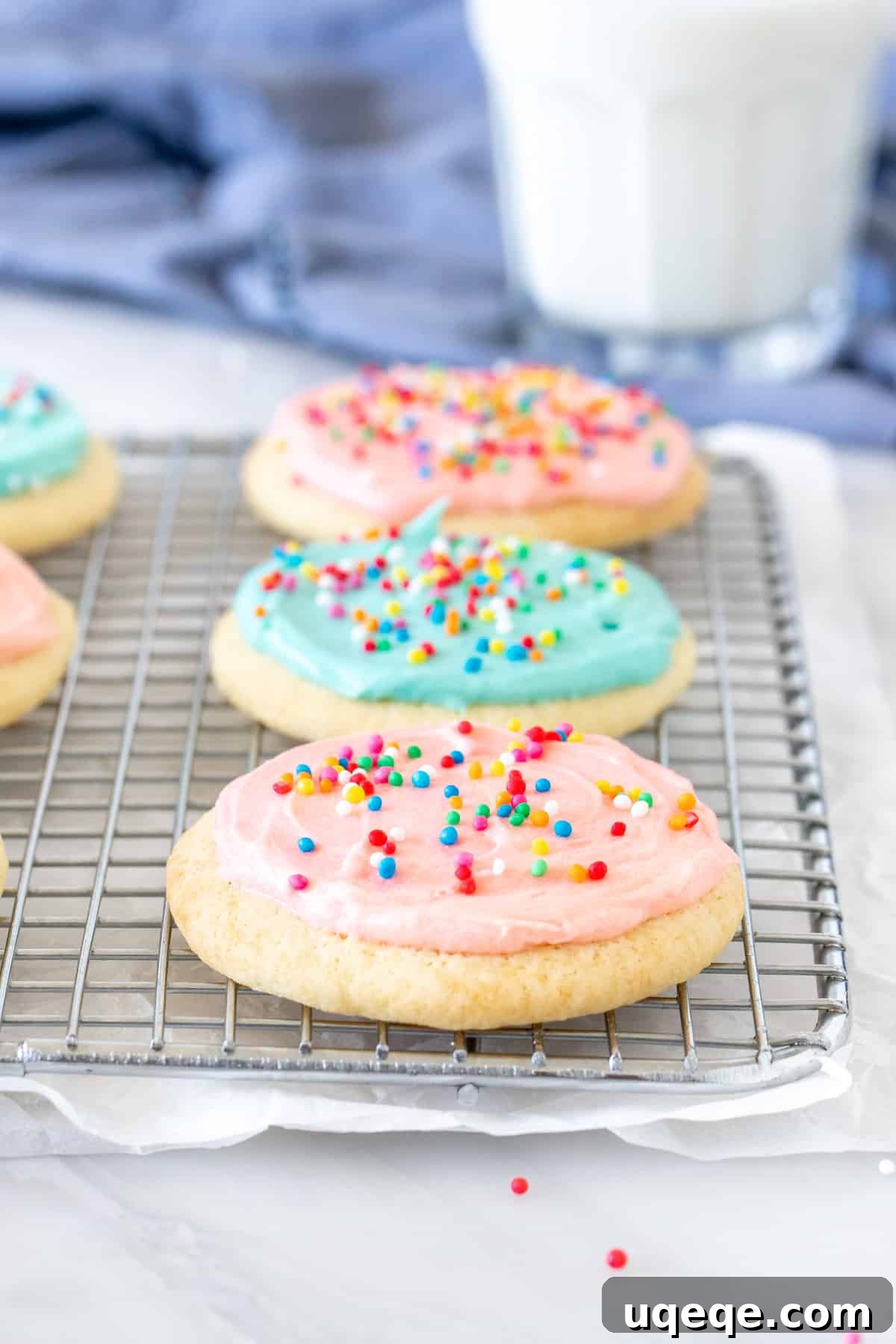 Pillowy Soft Sour Cream Sugar Cookies 2 Sour cream sugar cookies on a wire rack