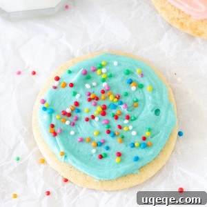 Pillowy Soft Sour Cream Sugar Cookies 7 Sour cream sugar cookie with blue frosting and sprinkiles