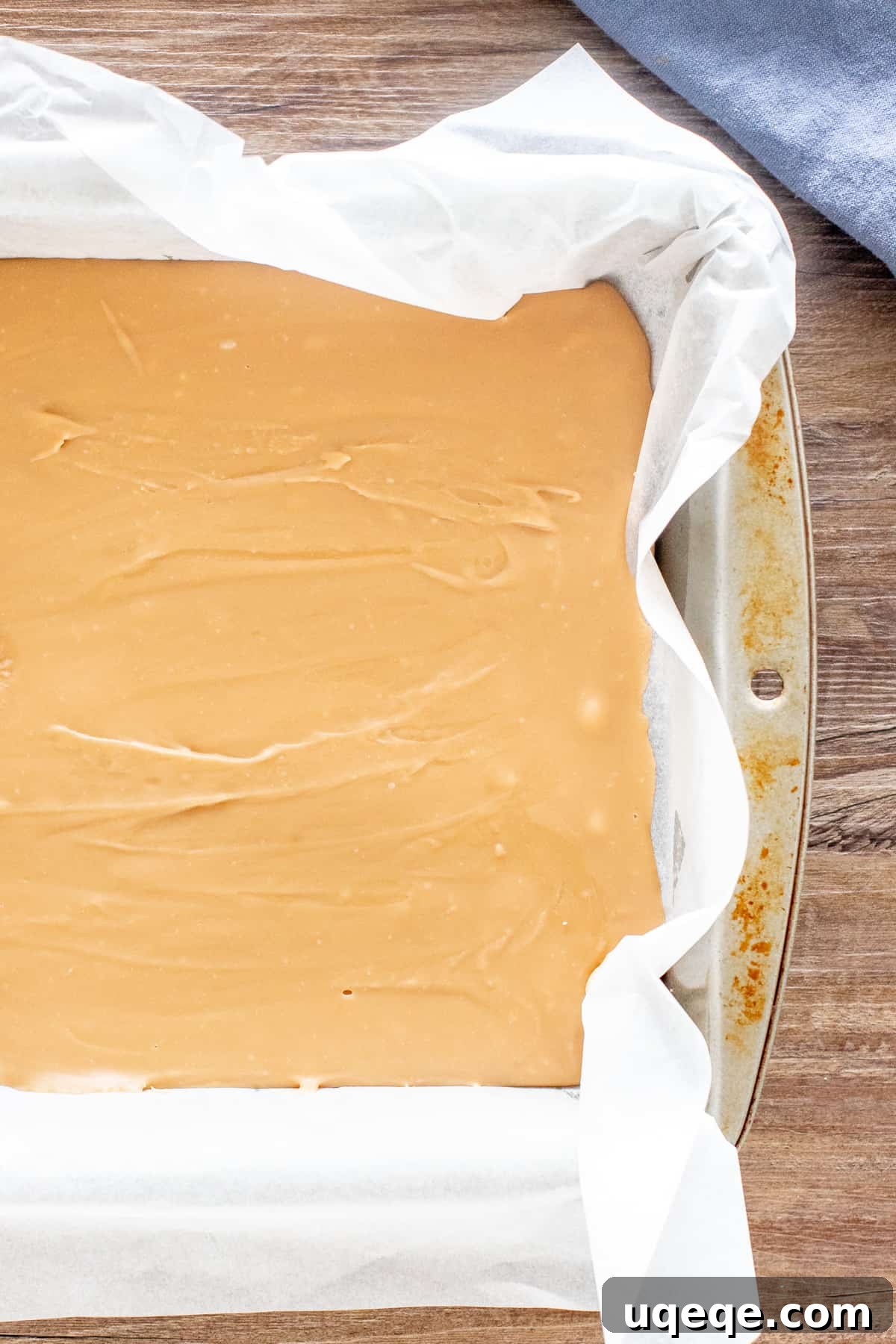 Effortless Condensed Milk Caramel Fudge 4 A pan filled with freshly made, still-setting caramel fudge, ready for chilling