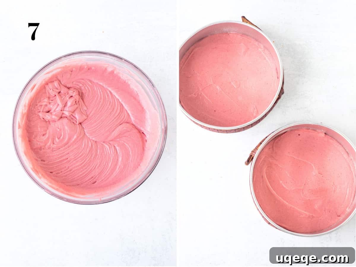 Sweet Strawberry Dream Cake 8 A bowl of bright pink strawberry cake batter next to two round cake tins, evenly filled with the batter, ready for baking.