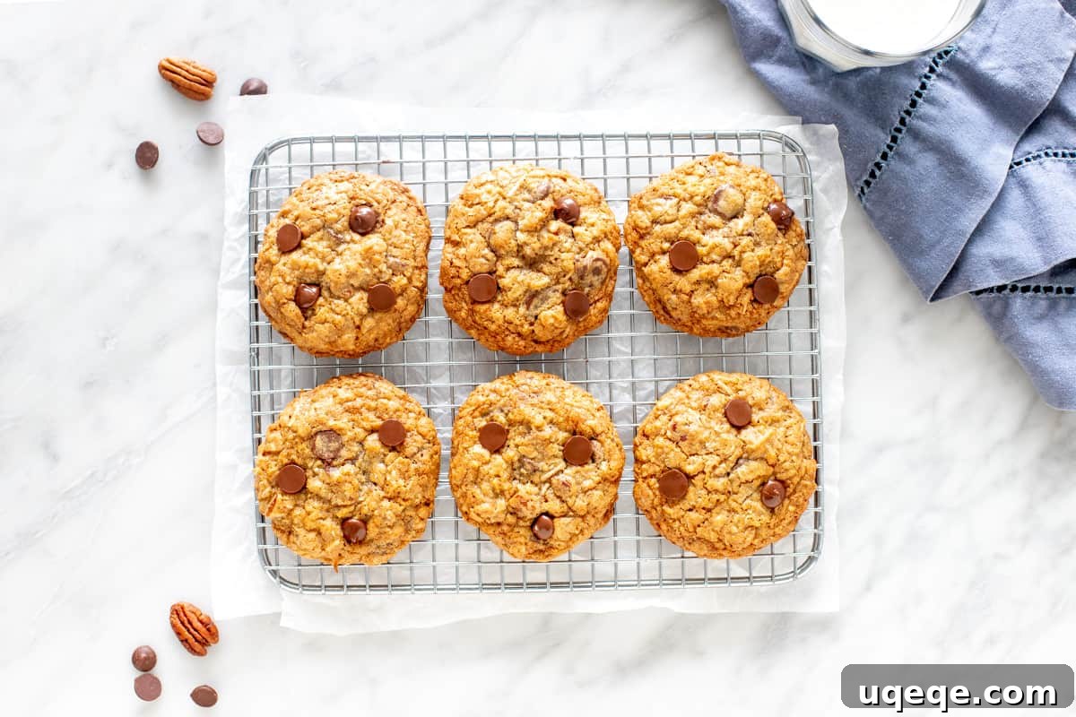 Chuckwagon Chews 3 Six cowboy cookies cooling on a wire rack, showcasing their perfect bake
