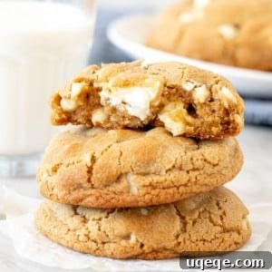 3 white chocolate chunk cookies, stacked on top of each other