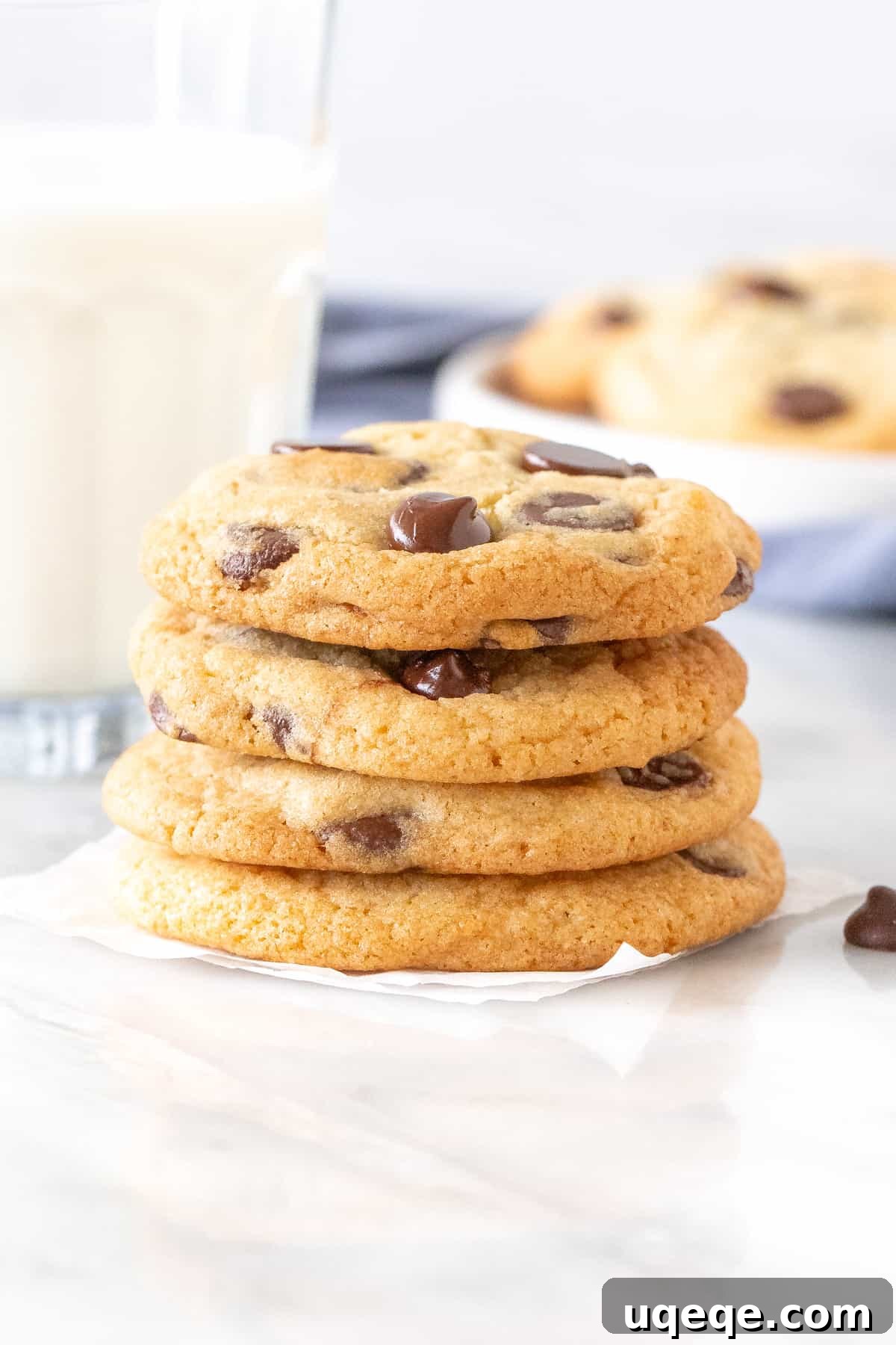 Perfect Chocolate Chip Cookies Brown Sugar Free 3 Stack of chocolate chip cookies with a glass of milk, highlighting the delicious result of this recipe.