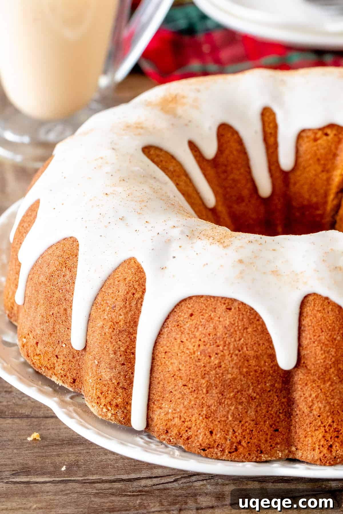 Holiday Eggnog Bundt Cake: Incredibly Moist, Tender, and Festive 2 Eggnog bundt cake drizzled with glaze, ready to serve for the holidays