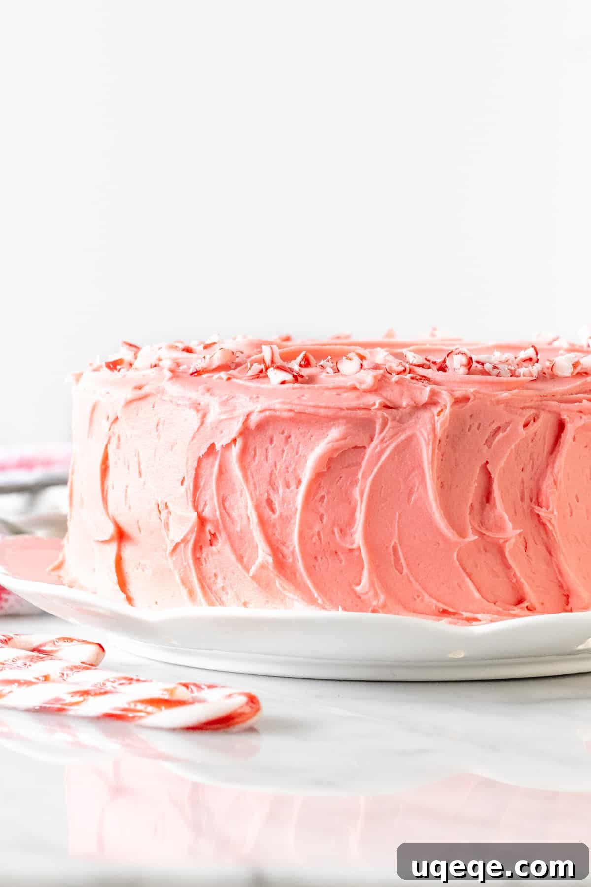 White Chocolate Peppermint Candy Cane Cake 2 Candy cane cake with pink peppermint frosting