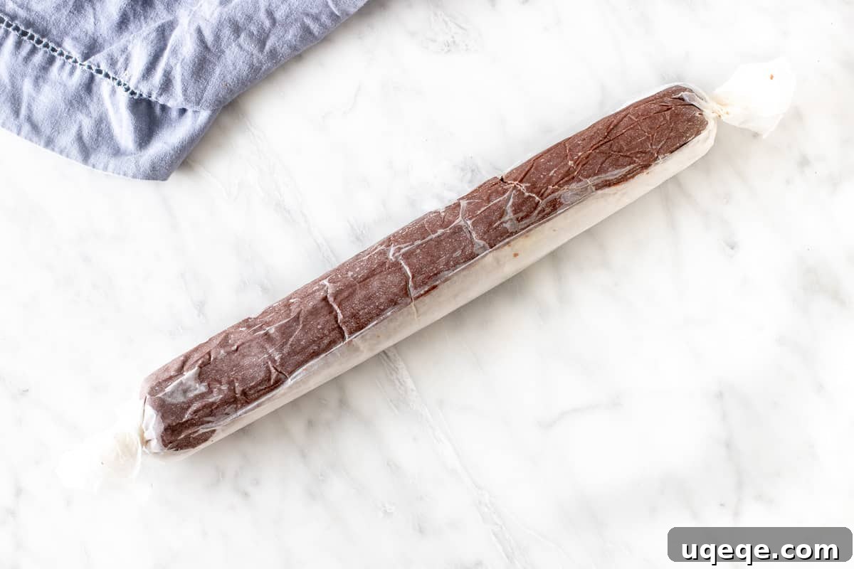 Buttery Chocolate Shortbread Bliss 3 Log of prepared chocolate cookie dough, ready for chilling and slicing