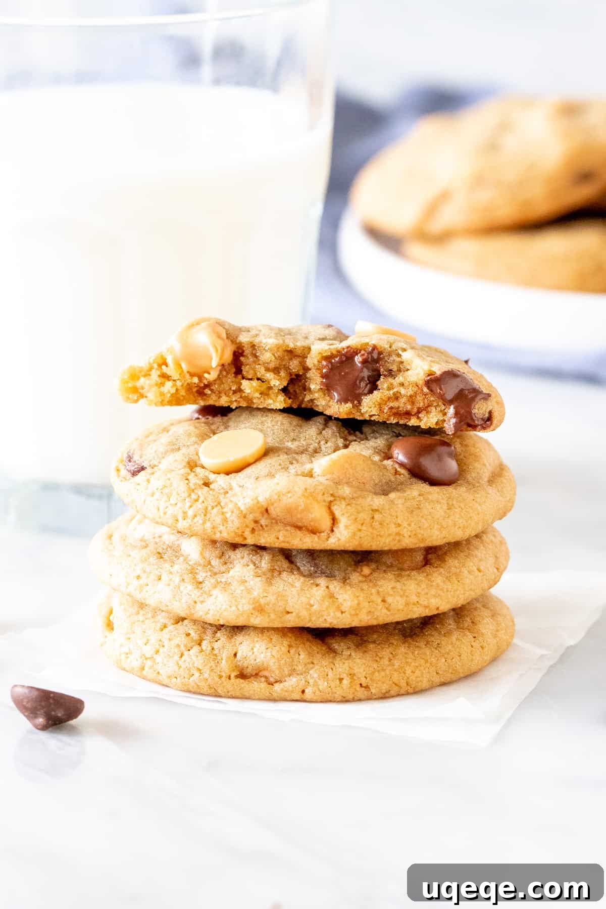 Perfectly Soft and Chewy Butterscotch Chocolate Chip Cookies 2 Stack of freshly baked chewy butterscotch chocolate chip cookies next to a refreshing glass of milk