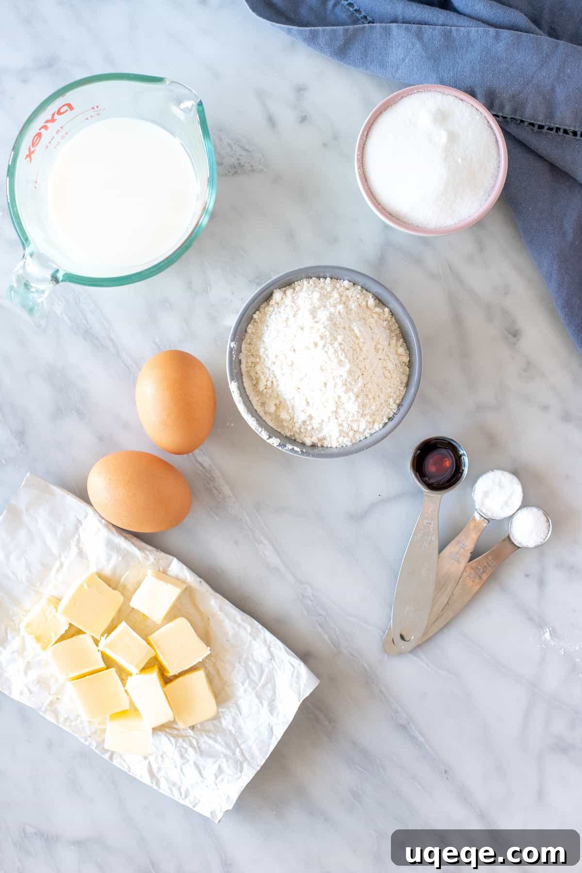 Unlock Your Baking Potential: Simple Tips for Superior Bakes 3 Baking ingredients meticulously measured out and perfectly arranged in small bowls, demonstrating the mis en place technique for preparing cupcakes.