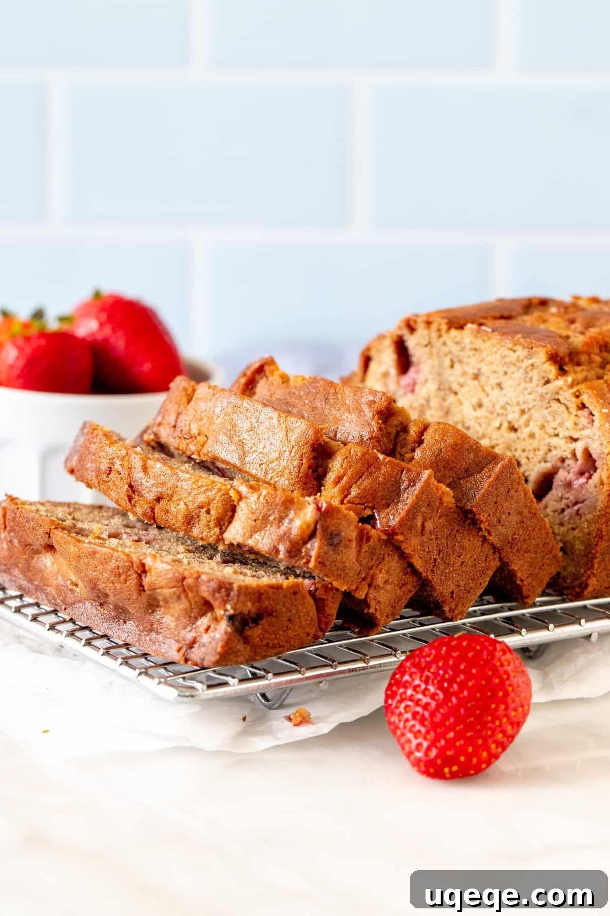 Luscious Strawberry Banana Bread 2 Strawberry banana bread with half the loaf sliced