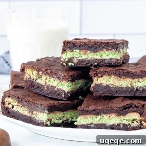 Plate of brownies with a mint layer in the middle