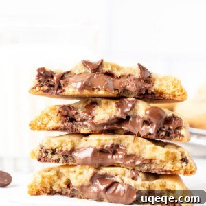 Nutella chocolate chip cookies, broken in half and stacked on top of each other