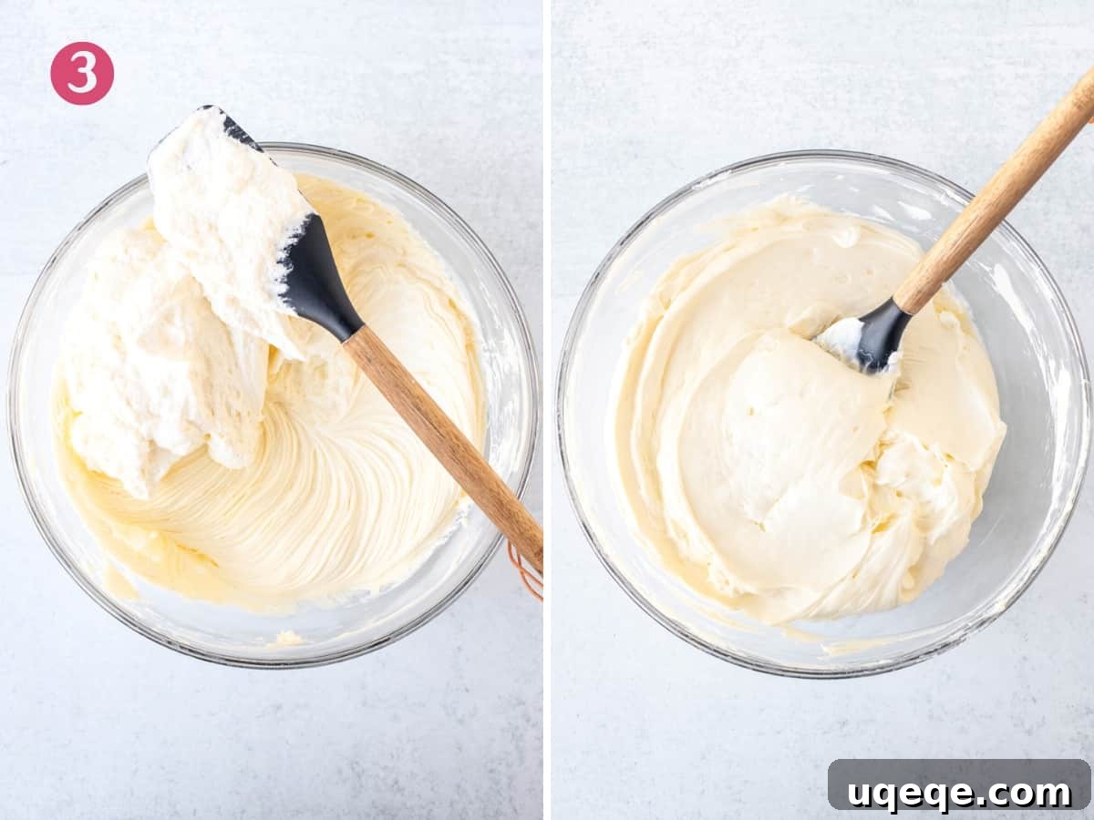 Ultimate Golden Oreo Cheesecake 6 A bowl of creamy cream cheese mixture topped with a generous dollop of whipped cream, transitioning to the final, evenly combined no-bake cheesecake filling.
