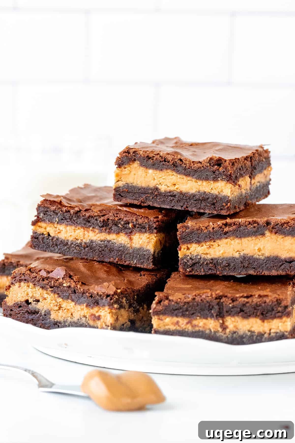 Peanut Butter Fudge Brownie Bombs 3 Plate of brownies made with peanut butter in the middle
