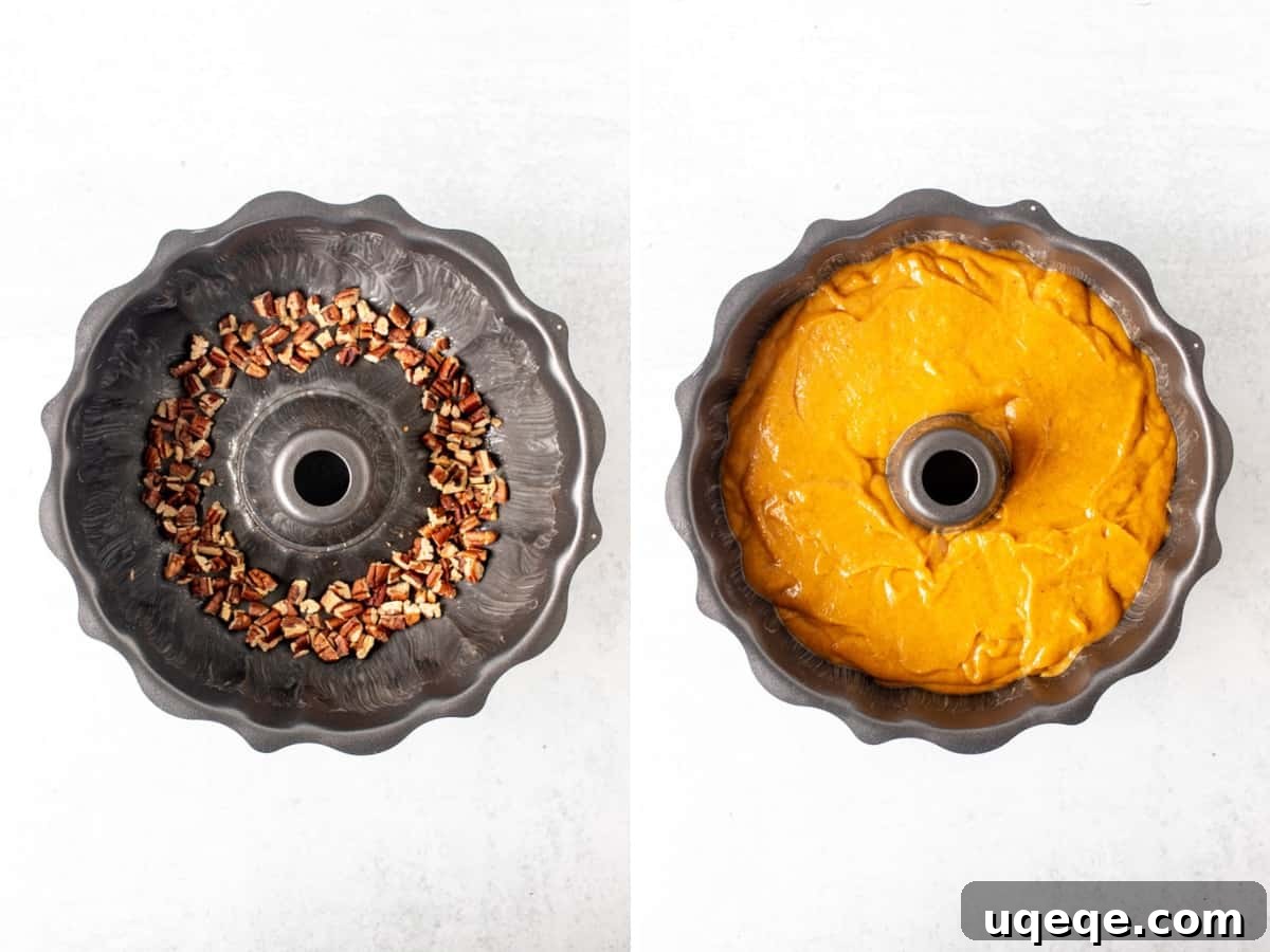 Bundt pan prepared with pecans and filled with pumpkin rum cake batter, ready for baking.
