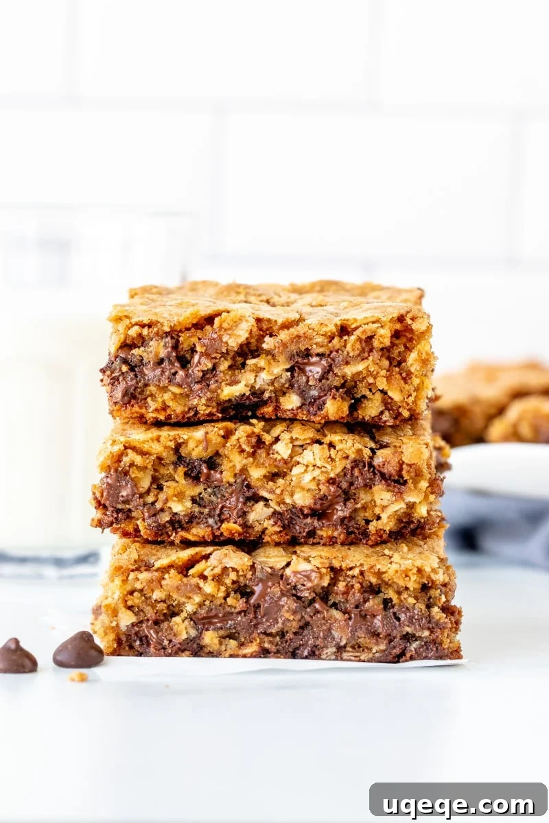 Chewy Oatmeal Chocolate Chip Bars 2 Stack of 3 thick and chewy oatmeal chocolate chip cookie bars with gooey centers