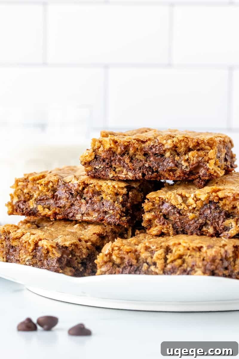 Chewy Oatmeal Chocolate Chip Bars 8 Plate of perfectly gooey oatmeal chocolate chip cookie bars ready to be enjoyed