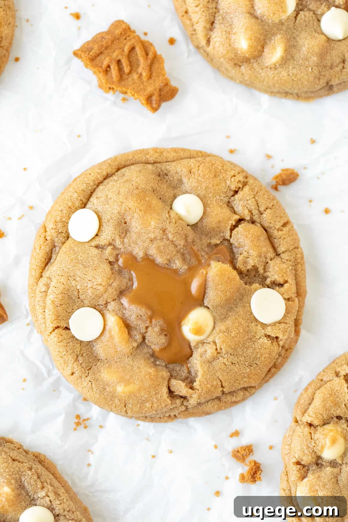 Biscoff Cookies Bursting with Cookie Butter 8 Biscoff stuffed cookie with white chocolate chips, viewed from above, showcasing its perfectly round shape.