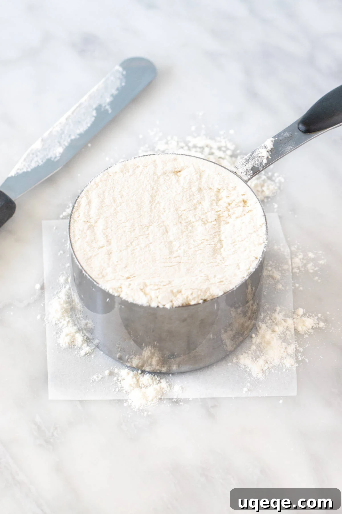 Mastering Flour Measurement With or Without a Kitchen Scale 2 Dry measuring cup of flour