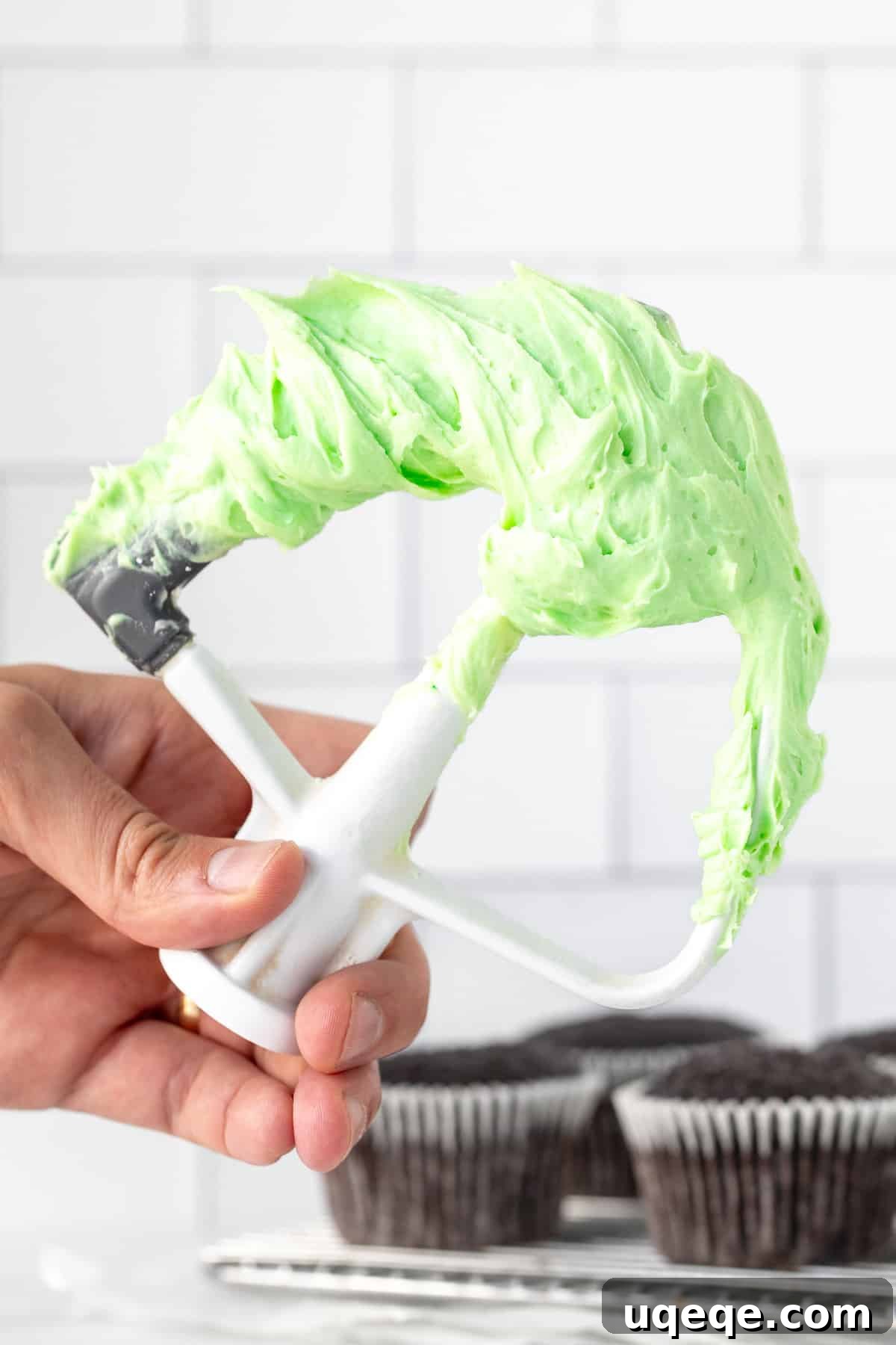 Velvet Mint Chocolate Dream Cupcakes 3 Stand mixer beater covered in mint frosting
