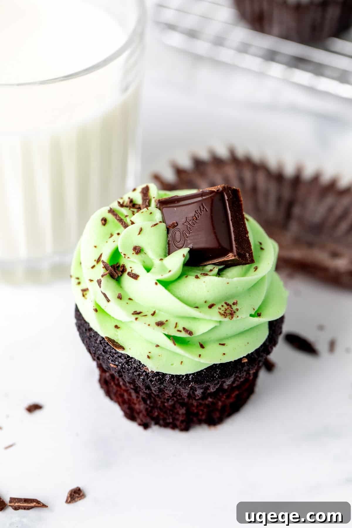 Velvet Mint Chocolate Dream Cupcakes 4 Mint chocolate cupcake with green mint frosting with a glass of milk