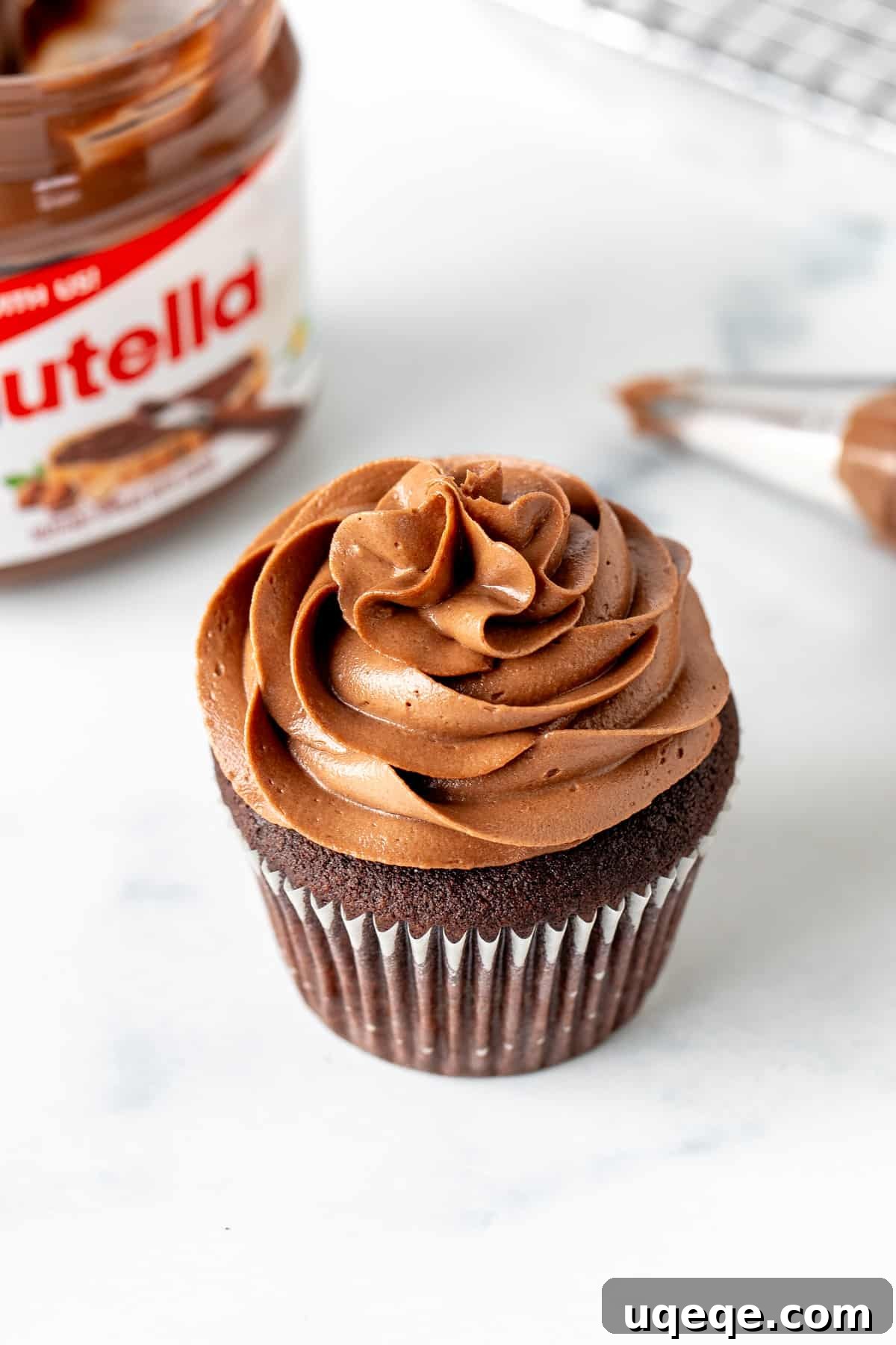 Decadent Nutella Frosting 3 Chocolate cupcake with Nutella frosting, beautifully piped