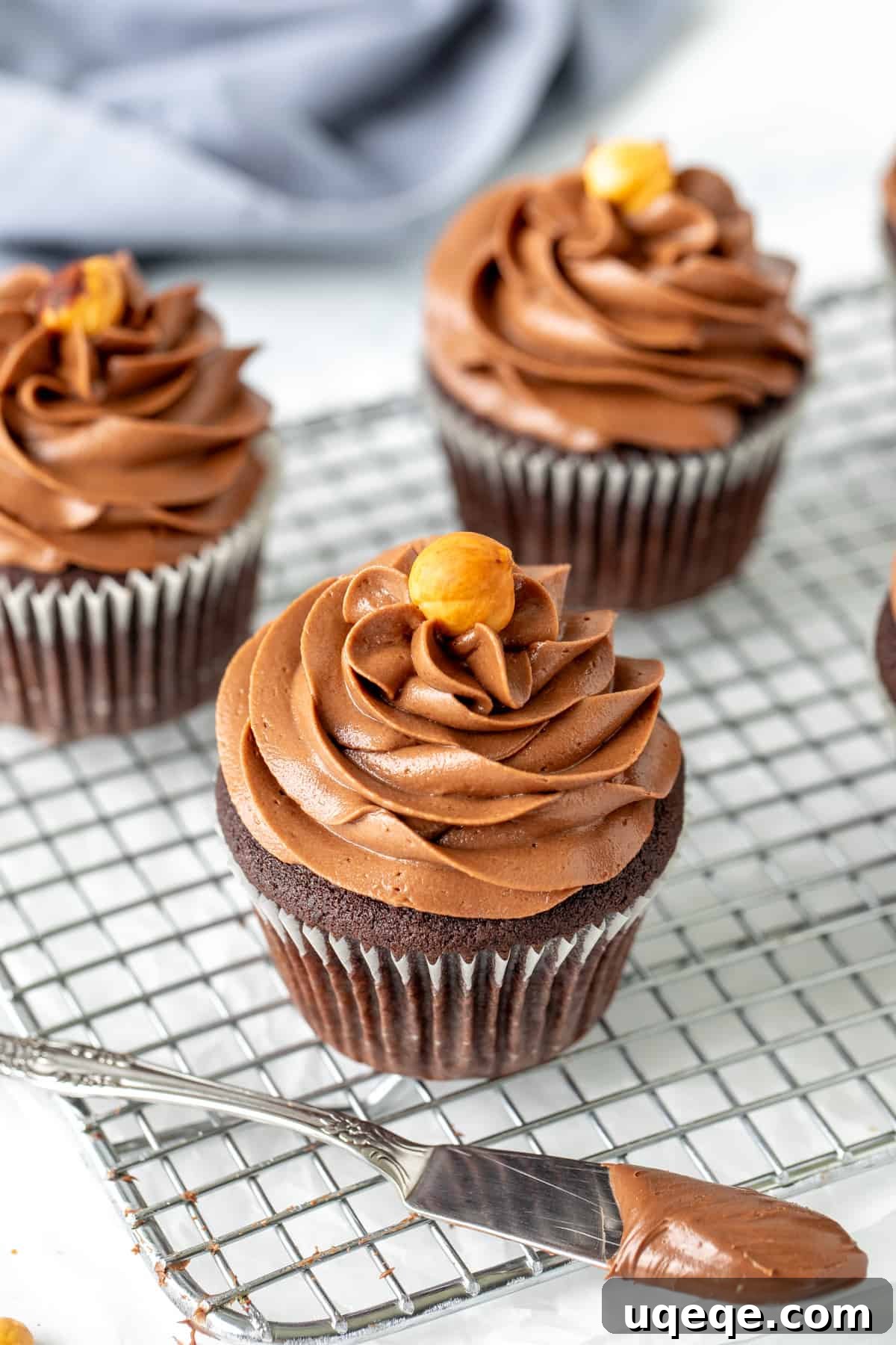 Nutella Dream Cupcakes 3 Wire cooling rack with Nutella stuffed cupcakes