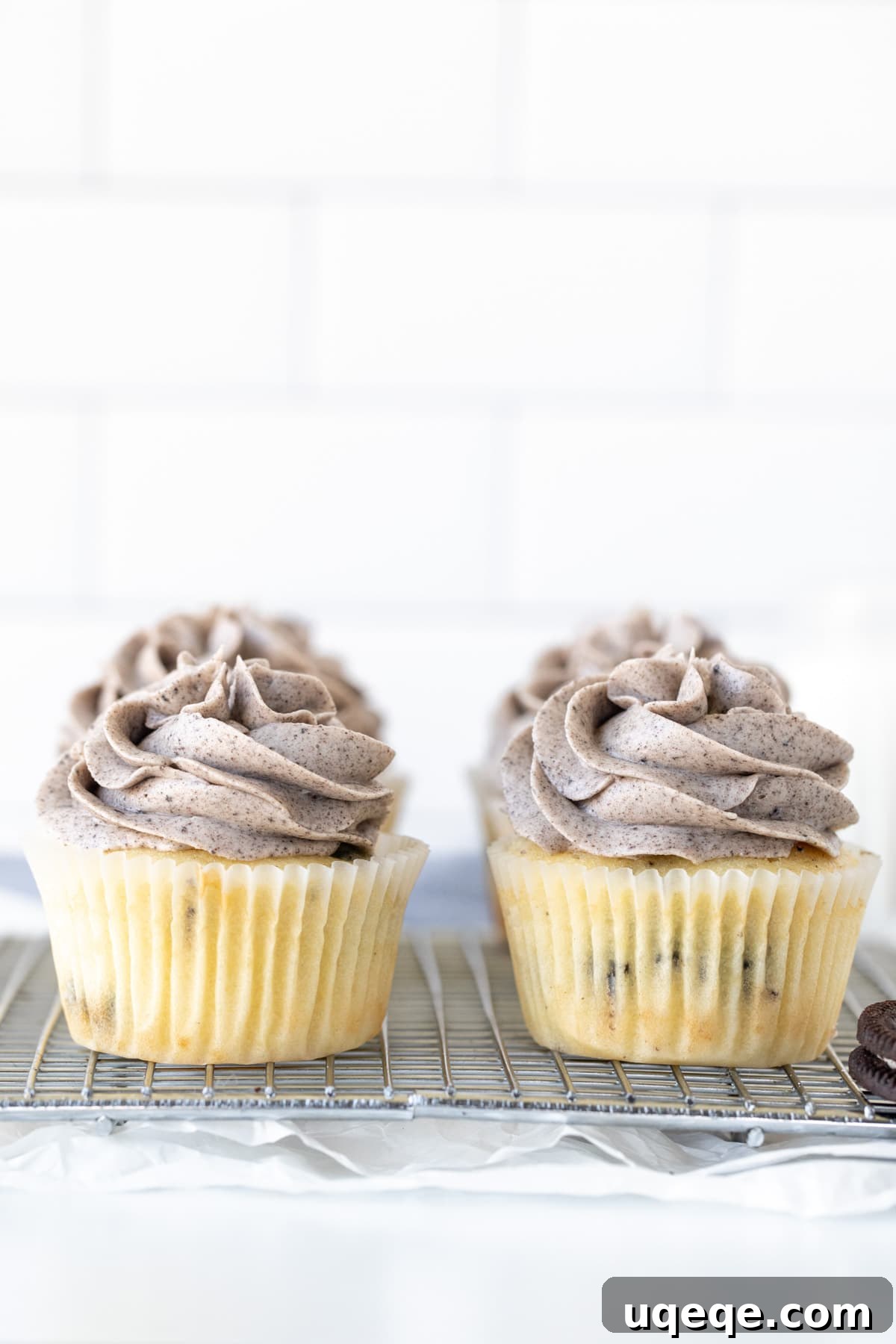 Cookies and cream cupcakes on a wire cooling rack