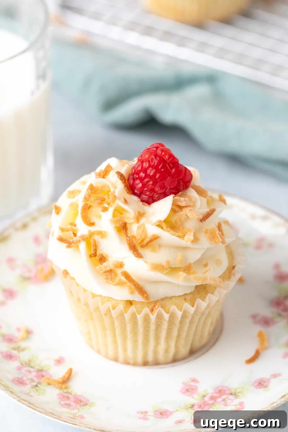 Tropical Cloud Cupcakes 6 Coconut cupcake on a plate with glass of milk