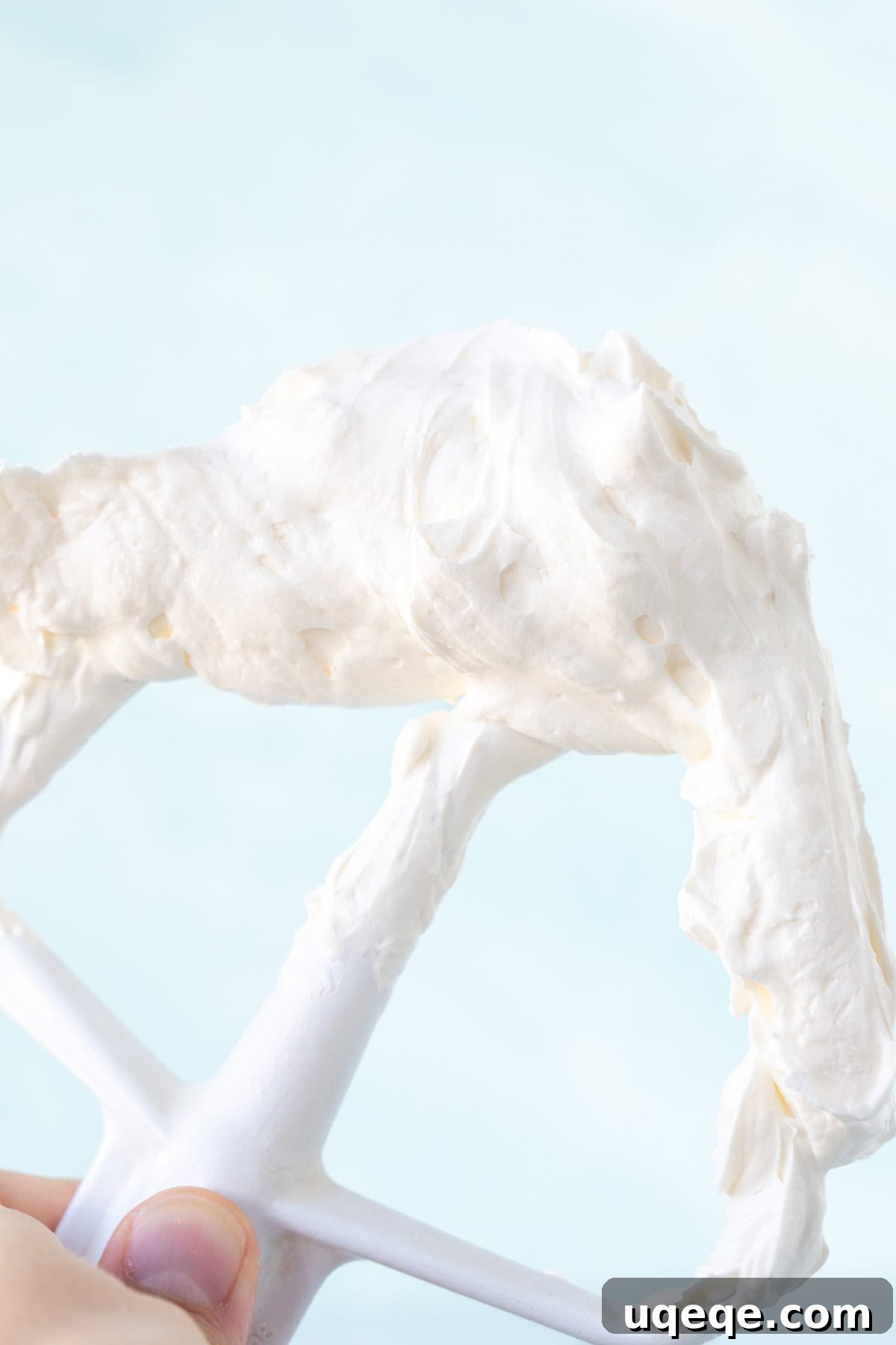 Silky Swiss Buttercream 6 Paddle attachment of stand mixer, covered in perfectly smooth Swiss meringue buttercream frosting