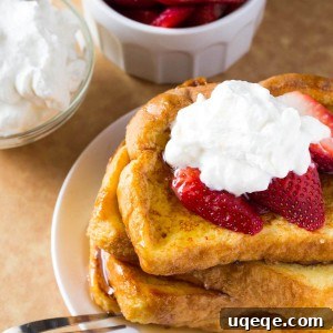 The BEST French Toast - fluffy, buttery, golden brown, topped with maple syrup and the best reason to get out of bed!