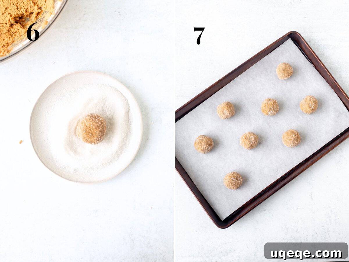 Chewy Brown Sugar Delights 6 A cookie dough ball perfectly rolled in sugar on a small plate, alongside multiple sugar-coated cookie dough balls spaced on a lined cookie sheet, ready for baking.