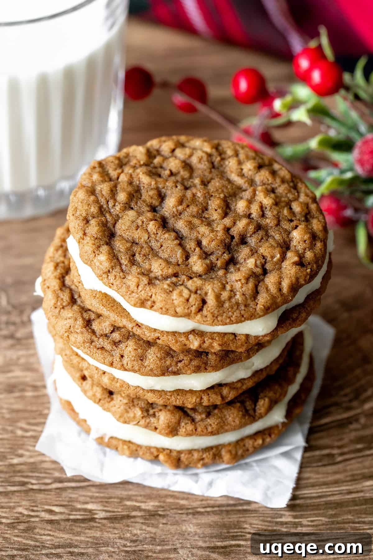 Spiced Gingerbread Oat Cream Dreams 2 Three gingerbread oatmeal cream pies, stacked on top of each other, showcasing their inviting texture and creamy filling.